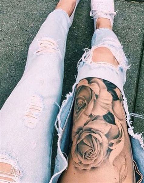 upper thigh tattoo|upper leg tattoos for females.